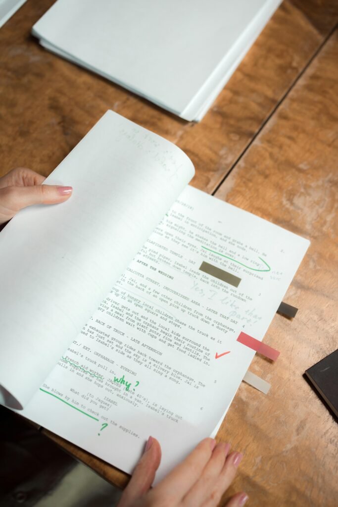 Person reviewing a marked-up printed document with editing notes and comments.

That’s all alt text needs to be. Clear. Descriptive. No keyword stuffing.