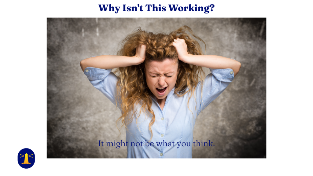Woman grabbing her hair in frustration while staring at a draft that isn't working